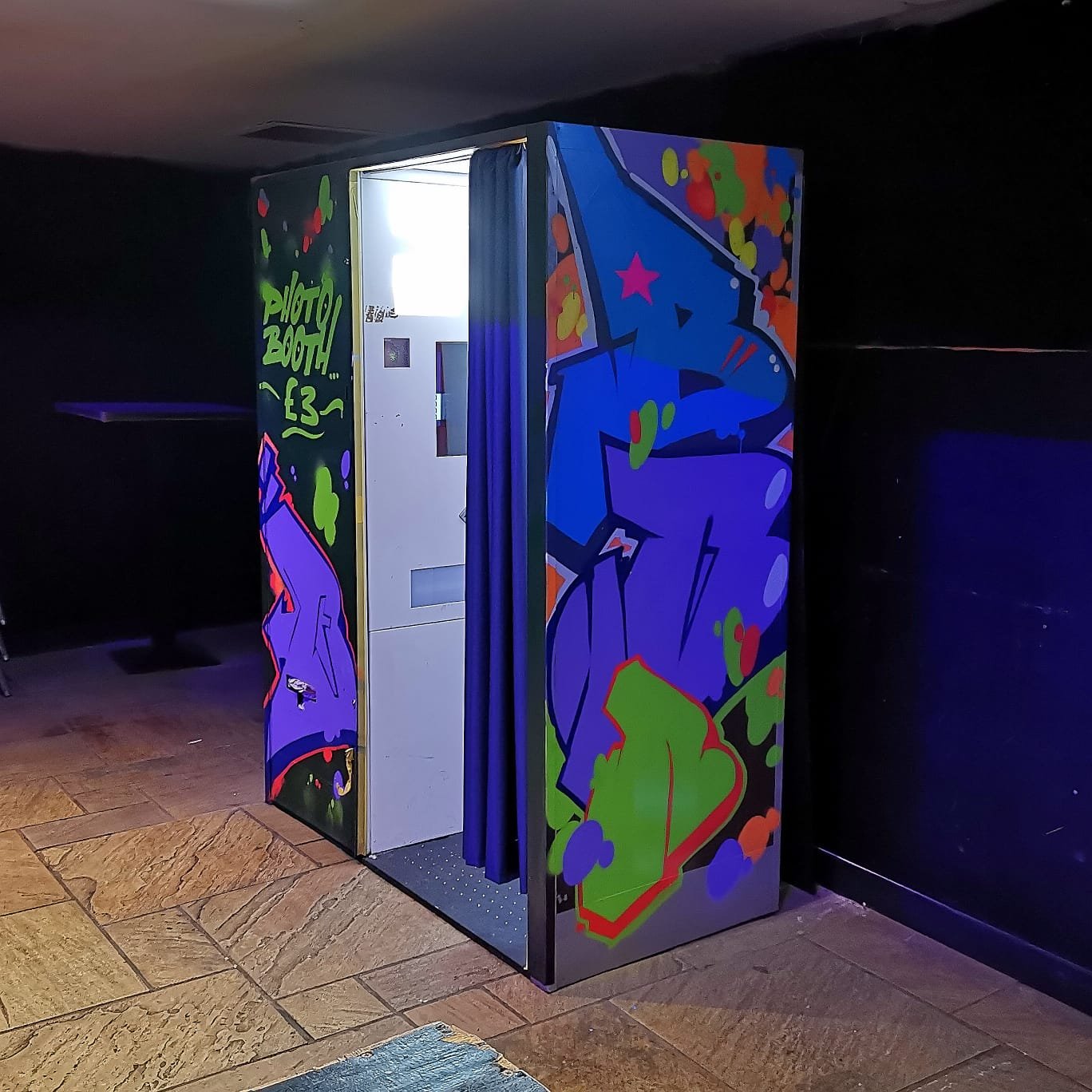 spectrum arts photo booth mural